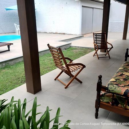 Casa ÍSIS de aluguel por temporada em Capão da Canoa com piscina Exterior foto