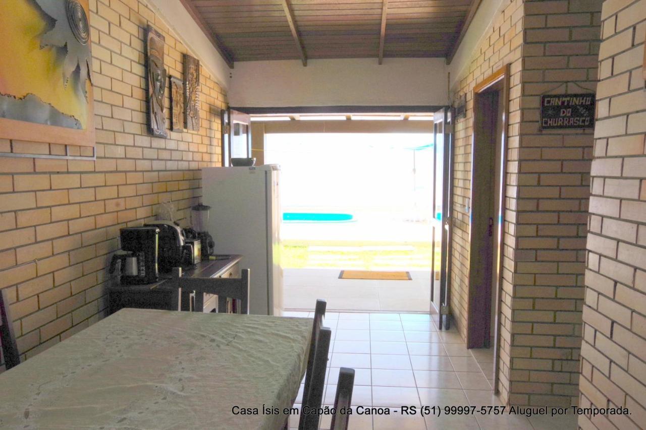Casa ÍSIS de aluguel por temporada em Capão da Canoa com piscina Exterior foto