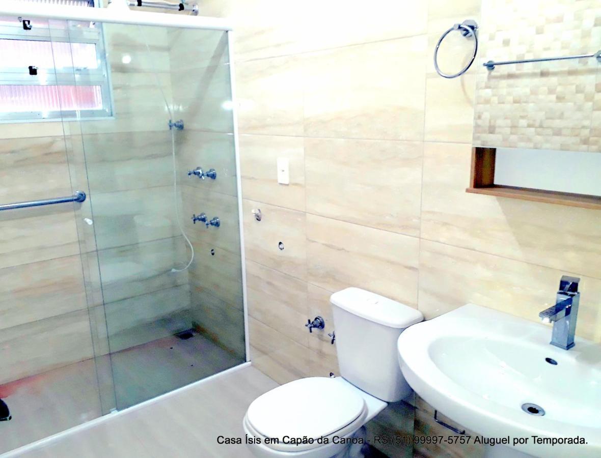 Casa ÍSIS de aluguel por temporada em Capão da Canoa com piscina Exterior foto