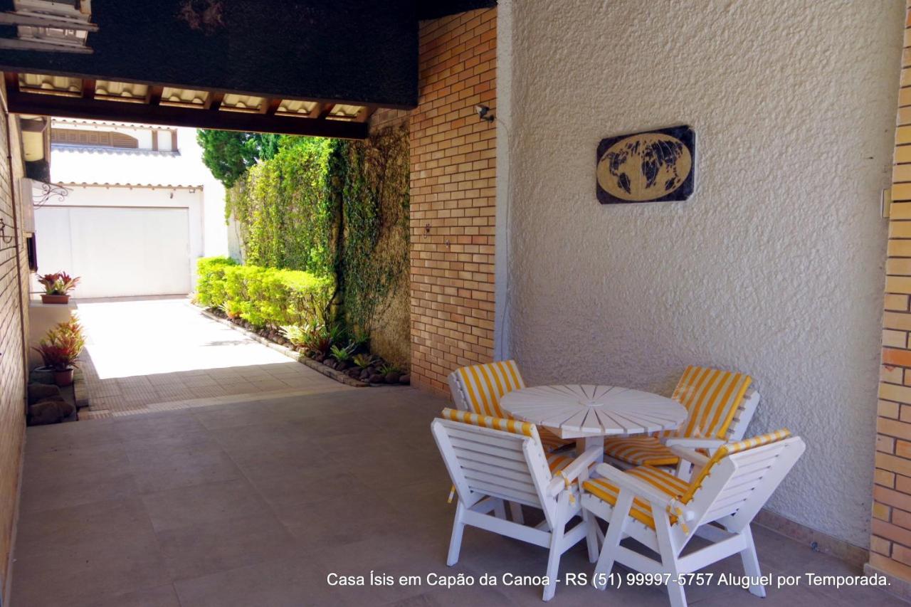 Casa ÍSIS de aluguel por temporada em Capão da Canoa com piscina Exterior foto