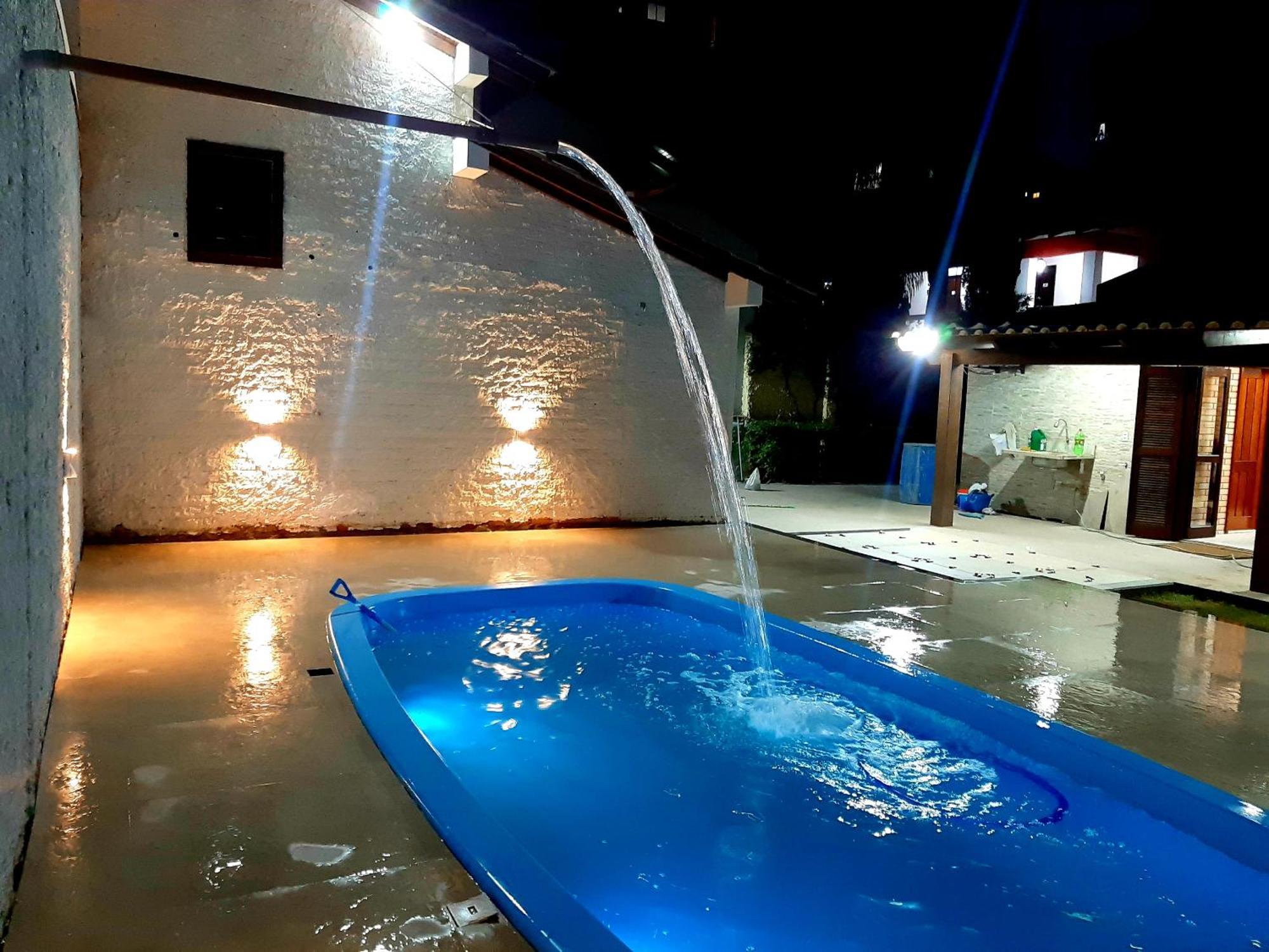 Casa ÍSIS de aluguel por temporada em Capão da Canoa com piscina Exterior foto