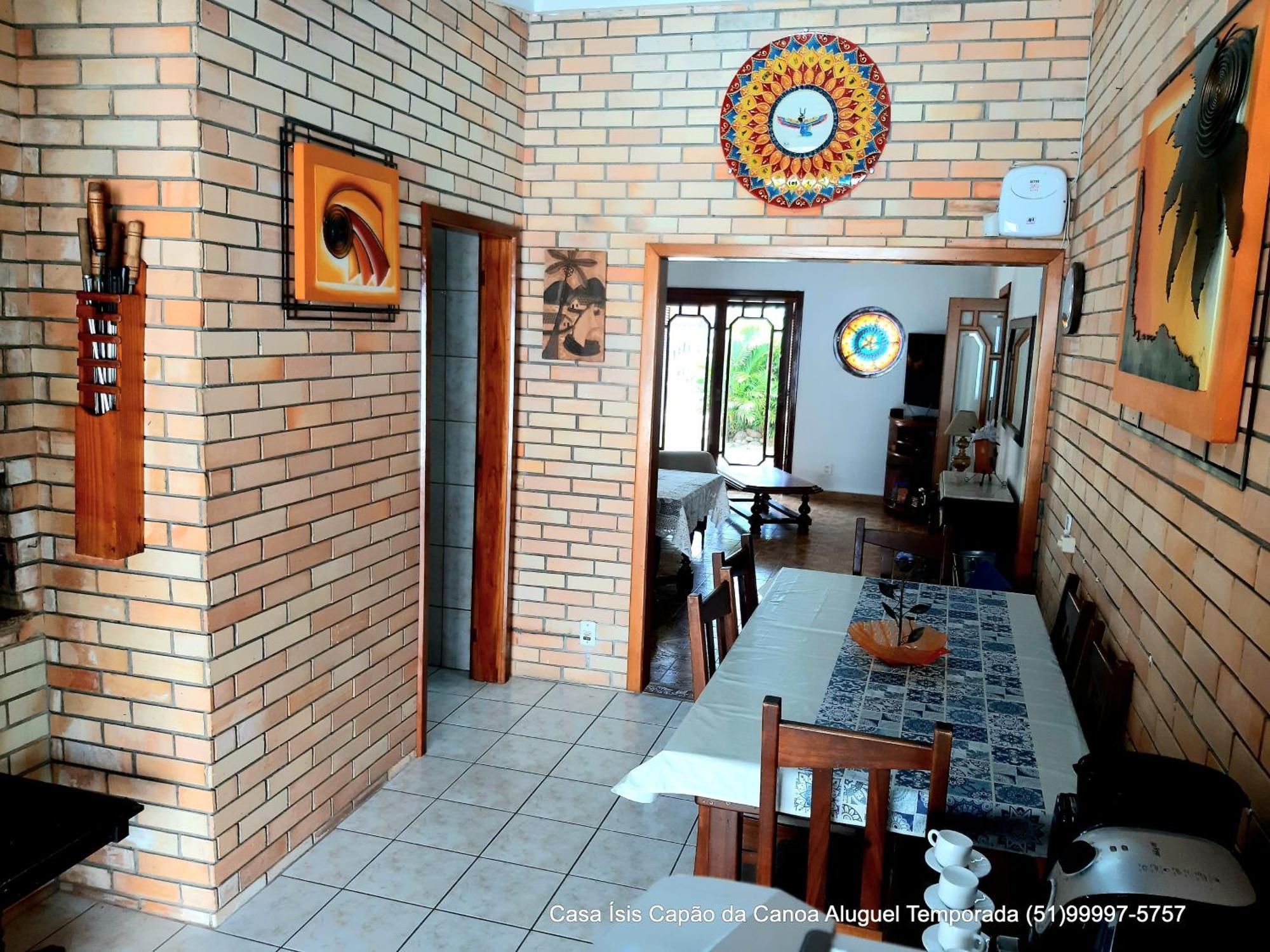 Casa ÍSIS de aluguel por temporada em Capão da Canoa com piscina Exterior foto