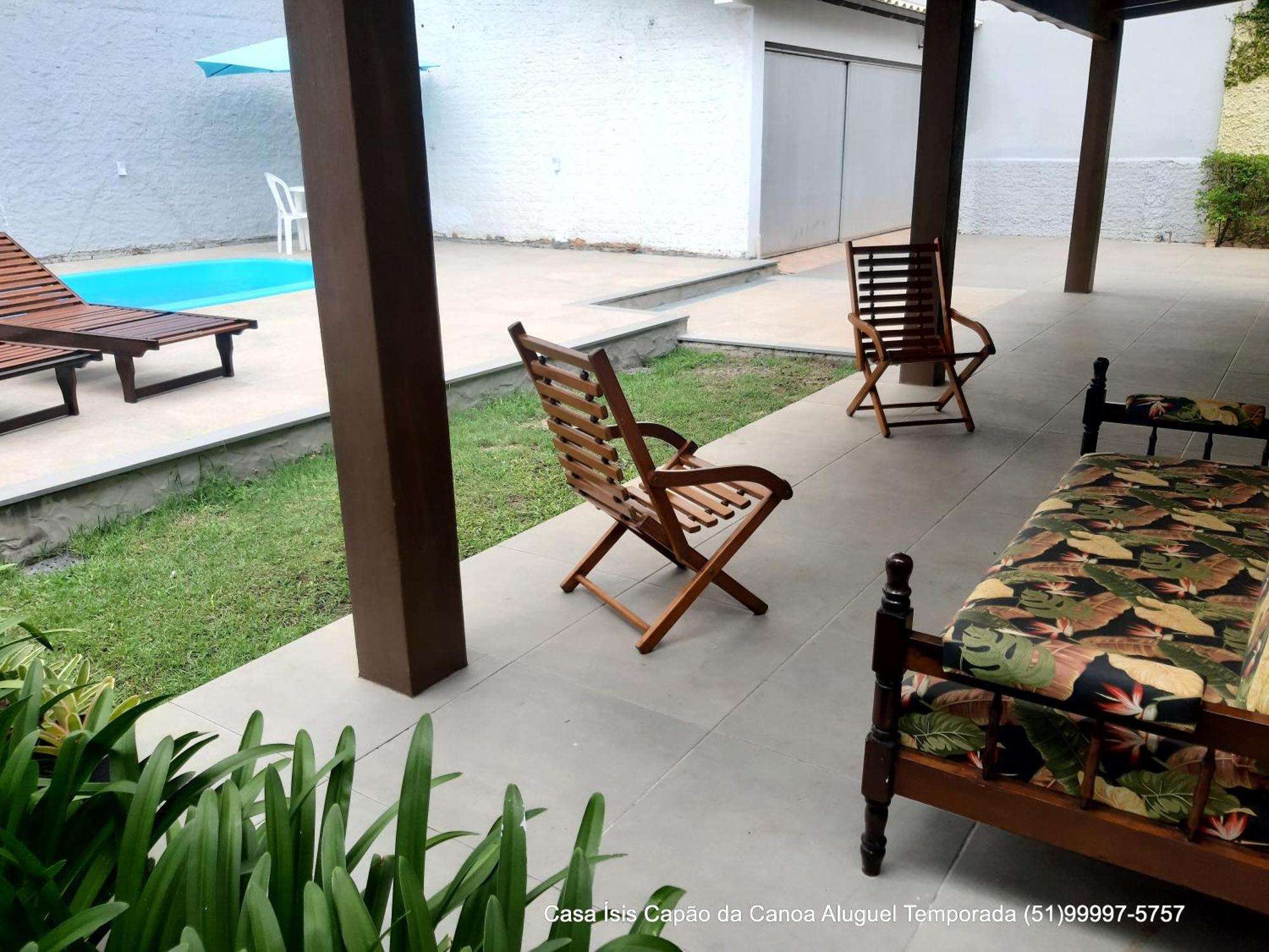 Casa ÍSIS de aluguel por temporada em Capão da Canoa com piscina Exterior foto