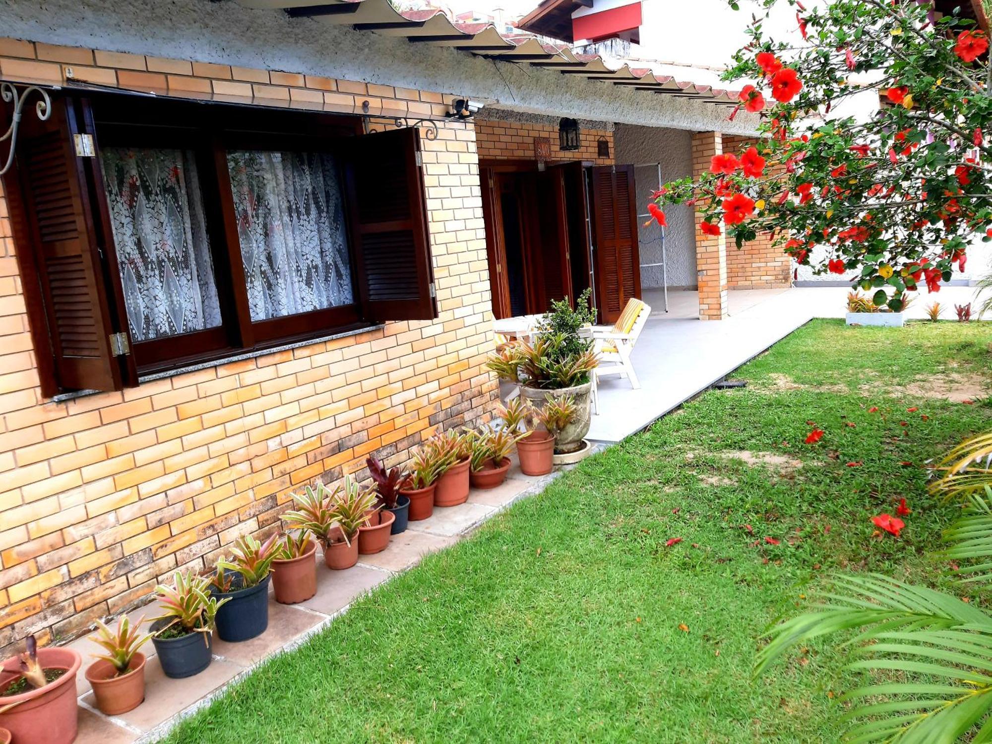 Casa ÍSIS de aluguel por temporada em Capão da Canoa com piscina Exterior foto