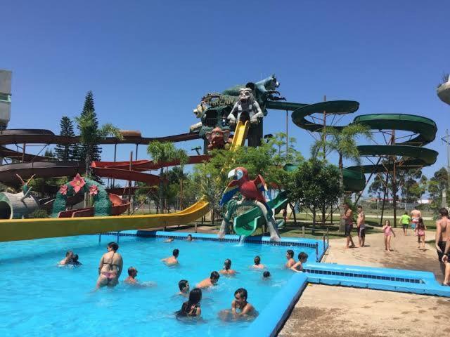 Casa ÍSIS de aluguel por temporada em Capão da Canoa com piscina Exterior foto