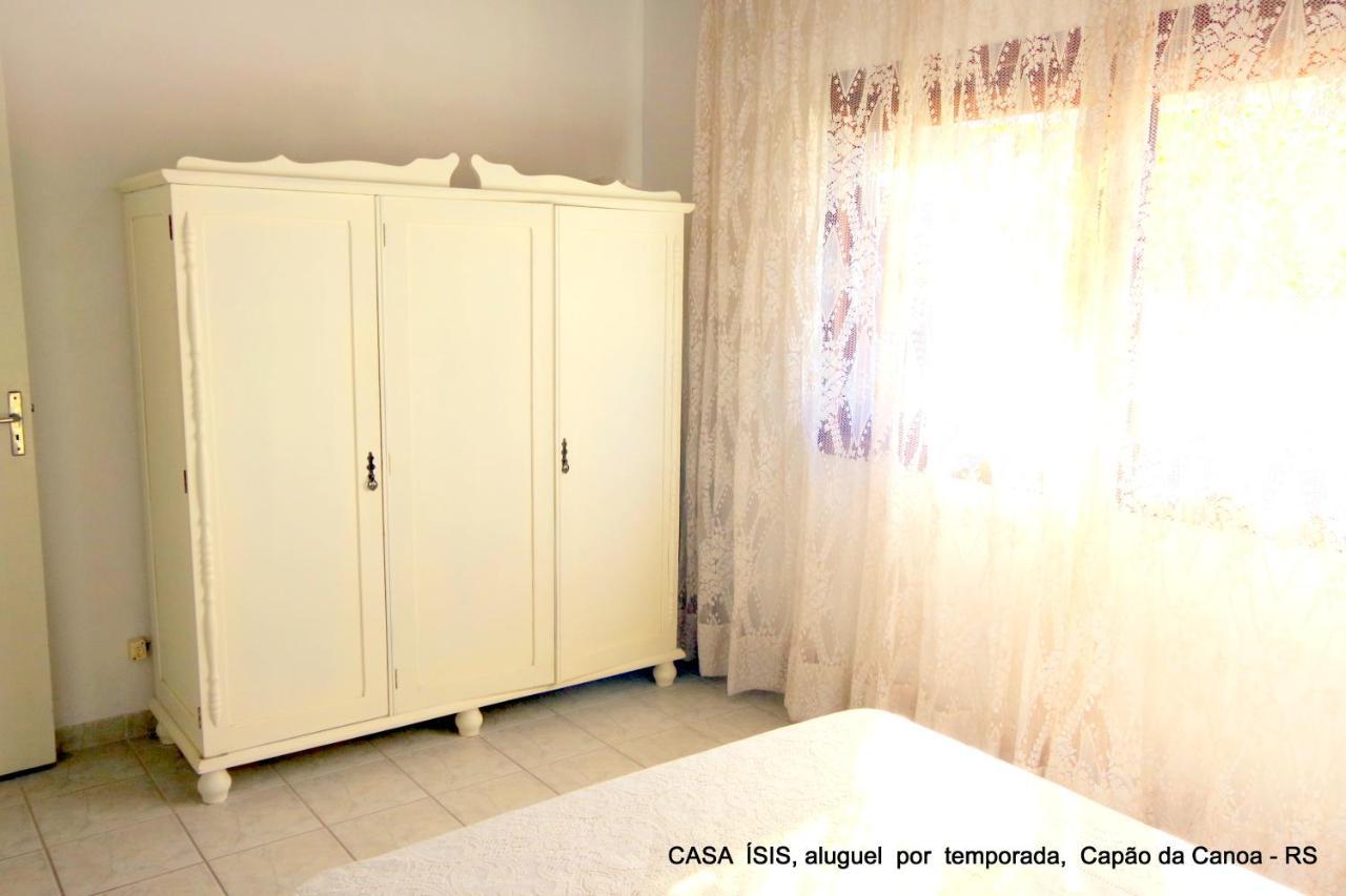Casa ÍSIS de aluguel por temporada em Capão da Canoa com piscina Exterior foto